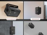 four different pictures of a camera mounted on a wall