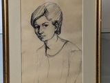 two framed drawings of a woman in a white dress and a black and white drawing of a woman