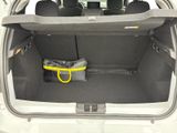 a trunk of a car with a bag in the back