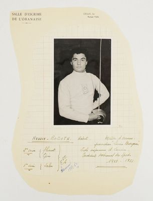 black and white photograph of a man holding a tennis racquet