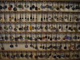 many key chains hanging on the wall of a room