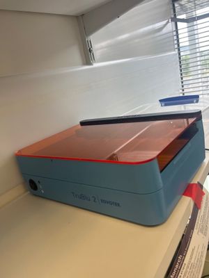 a blue and red box sitting on top of a white counter