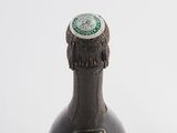 a bottle of wine that is sitting on a table