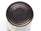 a can of food that is sitting on a table