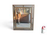 a man taking a picture of himself in a mirror