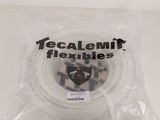 un sac de « Tecalemil Flexibles » posé sur une surface blanche