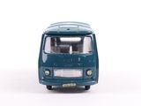 a blue toy van that is sitting on a white surface