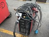 a lot of wires and equipment in the parking lot