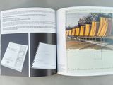 an open book with a picture of a train on it