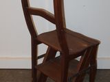 a wooden step stool next to a wooden step stool