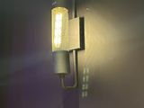 a light that is on on the wall in the room