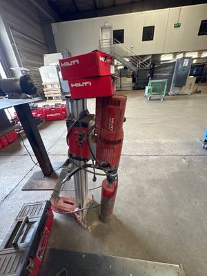 a red machine that is sitting in a room