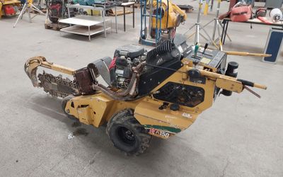 a small machine that is parked in a parking lot