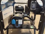 a machine that is sitting on a cart in a room