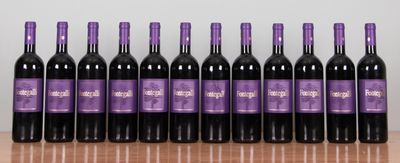 six bottles of wine are lined up on a table