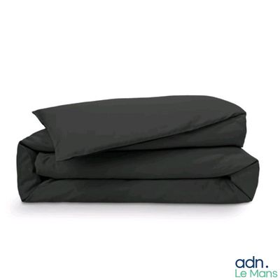 the black sheets are folded on top of each other on a white background