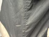 a close up of a person wearing a black jacket
