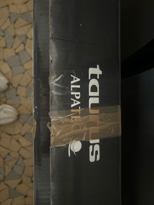 a black box with a sticker on it sitting on the floor