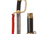 an image of a sword with a red handle and a black sheath
