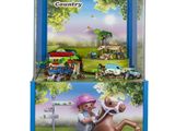 Coffret « Playmobil Country » avec cheval et cavalier dans une vitrine