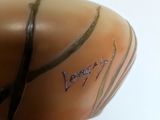 a close up of a vase with a bird on it