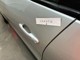 a sticker on the door of a car that says vauto
