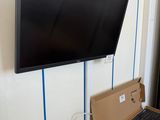 a laptop and a keyboard in a box on a table