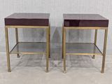 pair of brass and glass side tables with red leather tops
