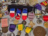 many medals and medals displayed on a table