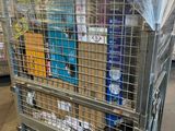 a large metal cart with a lot of items in it