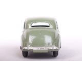a toy car that is sitting on a white surface