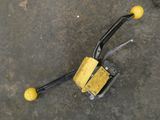 a close up of a yellow object on the ground