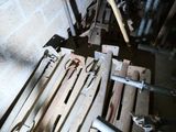 a lot of tools that are laying out on the floor
