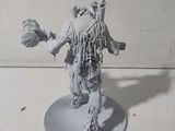 a close up of a miniature model of a man with a sword