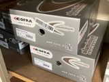two boxes that are sitting on a shelf in a closet