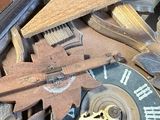 a wooden box with a clock inside of it