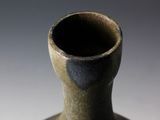 a small vase that is sitting on a table