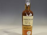 an image of a bottle of whisky sitting on a table