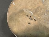 a close up of a metal object on a table