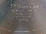 a close up of a circular saw blade on a table