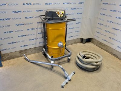 an image of a vacuum and a hose in a room