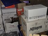 several boxes of wine are stacked on top of each other