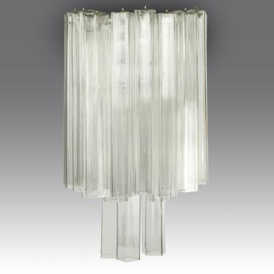an image of a large glass lamp hanging from a ceiling