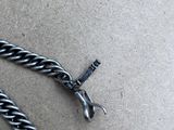 a chain that has been pulled up on the ground