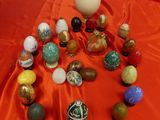 a lot of eggs on a red table cloth