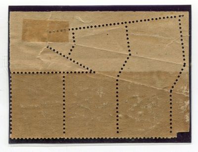 une image représentant un morceau de papier brun parsemé de points noirs