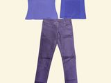 purple jeans and a blue shirt are sitting next to each other