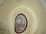a white hat that has a banana label on it