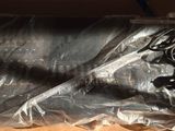 un sac en plastique contenant un appareil électronique quelconque