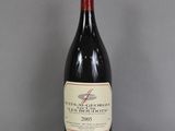 a bottle of wine that is sitting on a table